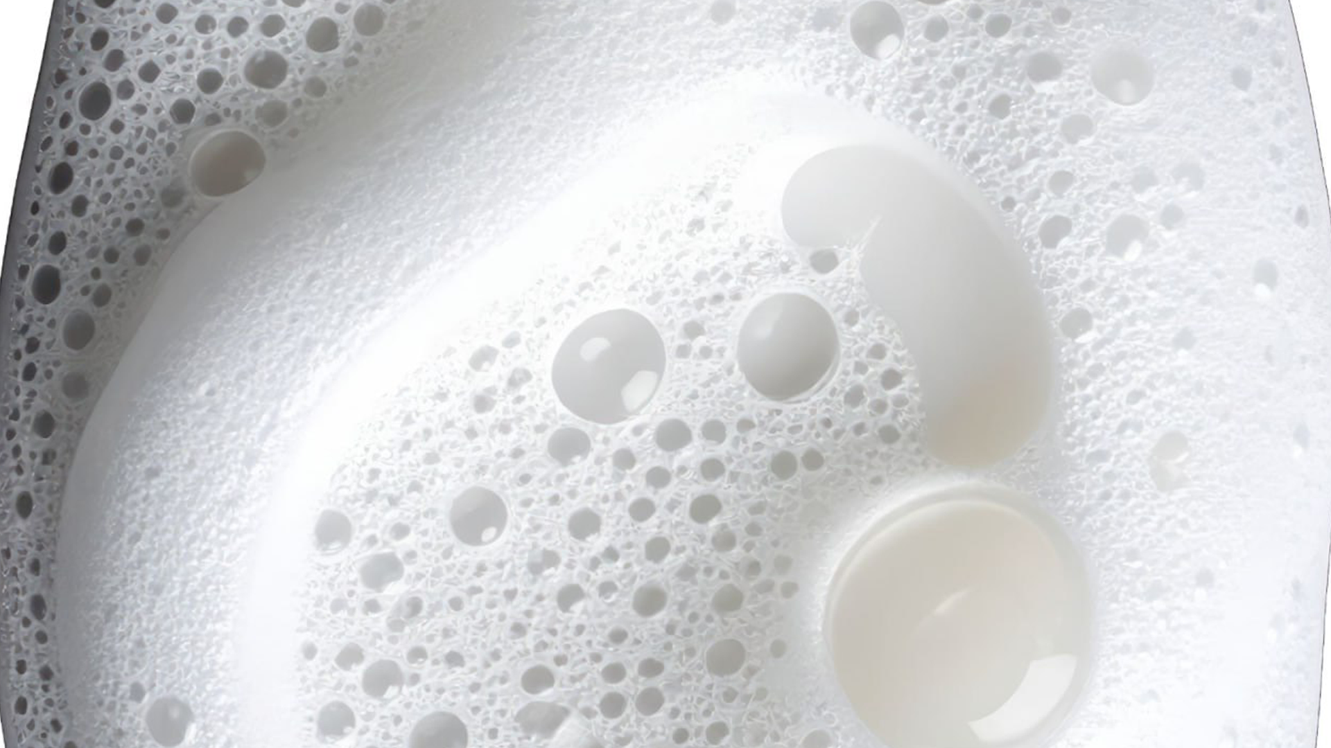 Close-up of a white surface with bubbles